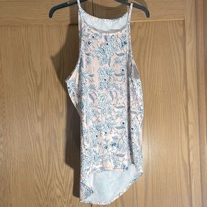 Blush pink tank top with navy blue and white flower accents